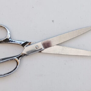 Close-up of a perfectly sharpened scissor blade
