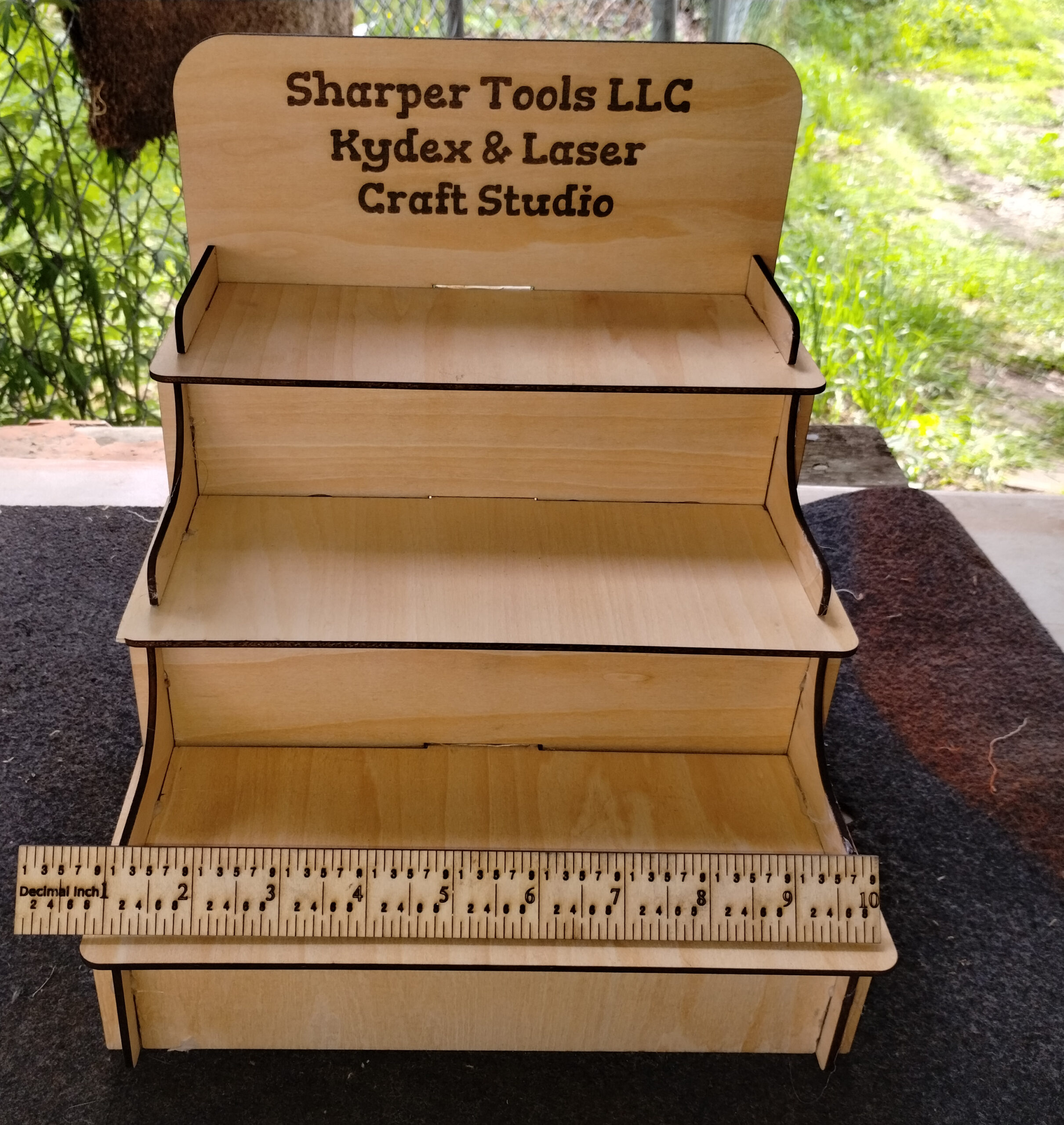 3 level laser cut display shelf with custom engraving